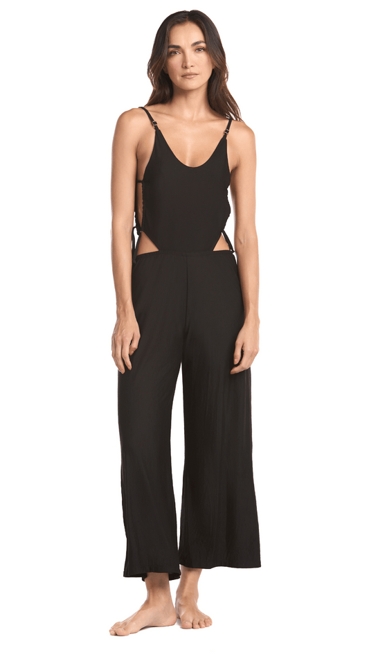 jumpsuit negro Ojo de tigre es un enterizo muy versátil, elaborado con una tela fresca y ligera