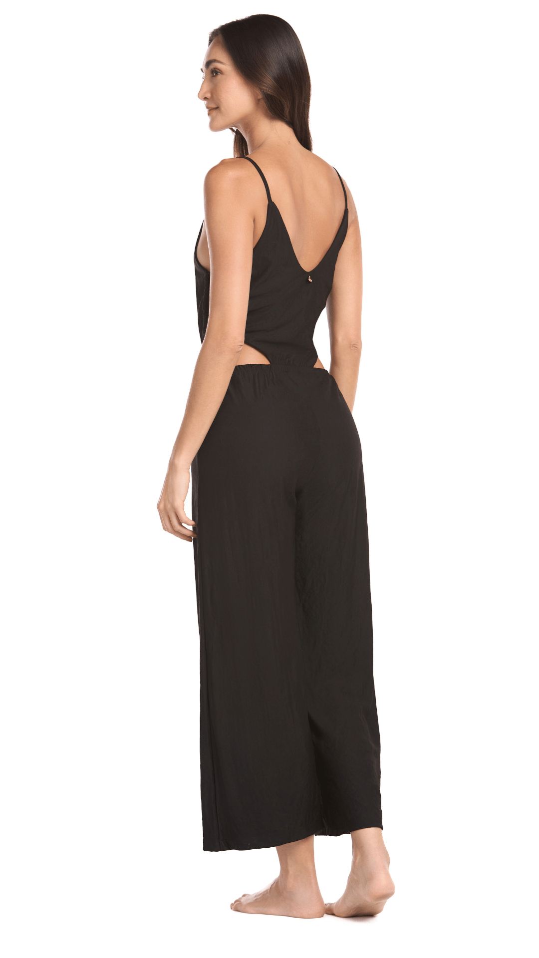 jumpsuit negro Ojo de tigre es un enterizo muy versátil, elaborado con una tela fresca y ligera